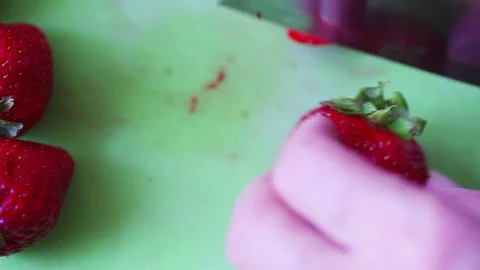 Slicing strawberries point of view 스톡 동영상 79235053