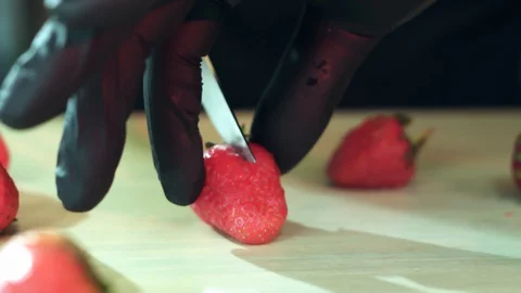 Slicing a strawberry Stock Footage 129077553