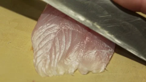 Slicing sushi thin fish Stock Footage 113275914