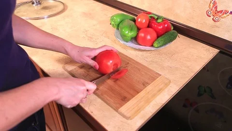 Slicing a tomato Stock Footage 100989285