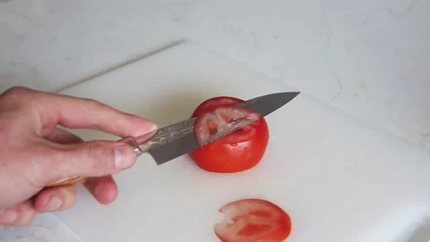 Slicing Tomato Stock Footage 219768099