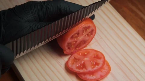 Slicing a tomato Video stock 304219983