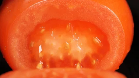 Slicing tomato . Macro . 库存影片 74076021
