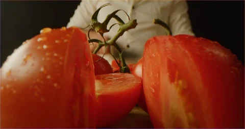 Slicing tomato macro shot Stock Footage 126295159