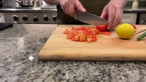 Slicing Tomato Pan L-R Stock Footage 320032299