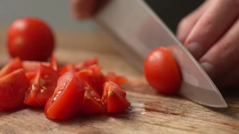 Slicing Tomatoes on Cutting Board. Stock Footage 263365368