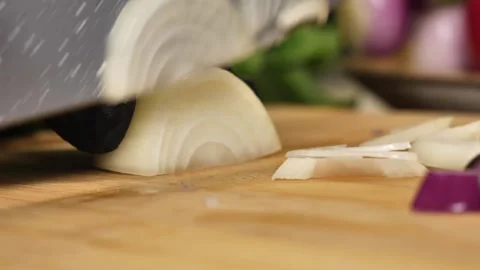 Slicing White Onion into Half-Moons Stock Footage 311391092