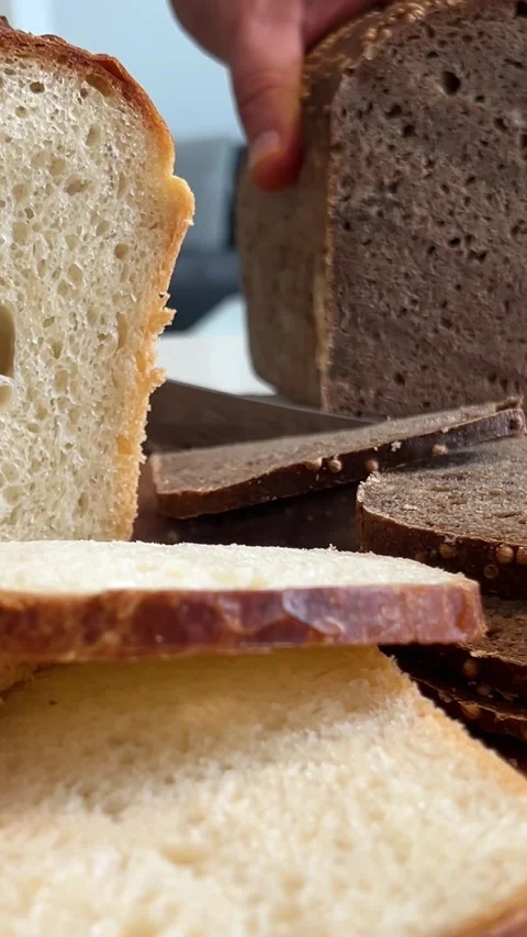 Slicing Wholegrain Bread Cri On Slice For Bruschetta. Cutting Sourdough Bread On Stock Footage 274482607