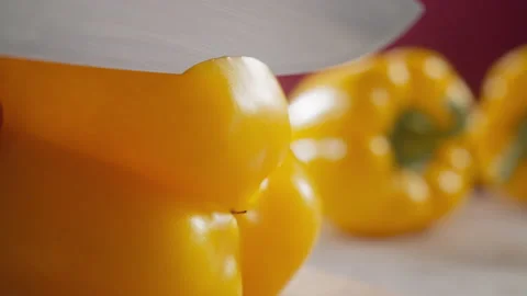 SLICING YELLOW BELL PEPPER BOTTOM Stock Footage 132749268