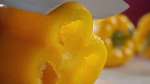 SLICING YELLOW BELL PEPPER Stock Footage 132749955