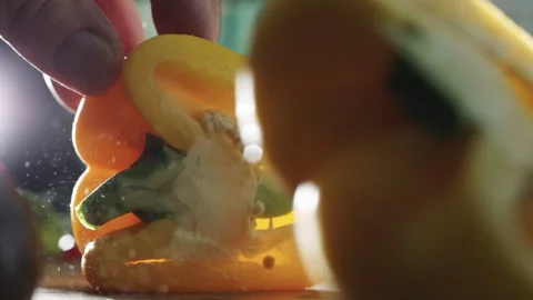 Slicing yellow pepper Stock Footage 219484229