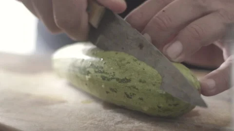 Slicing zucchini with a knife Video stock 137217253