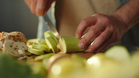 Slicing zucchini into slices Stock Footage 311835232
