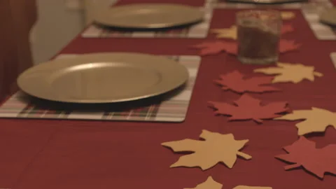 Slide across table from one place setting to the next Stock Footage 168840435
