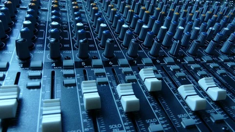Slide along an audio mixing console Stock Footage 87289772