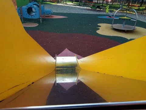 Slide for childrens in the park Photos
