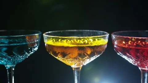 Slide close up of several transparent drinks on a table in elegant cocktail glas 스톡 동영상 117778790