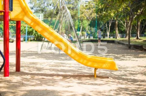 Slide from crawl construction on modern kids playground Stock Photos