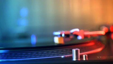Slide defocus in focus. Vinyl player turntable. A rotating vinyl record Stock Footage 91732806