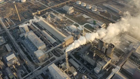 Slide the drone over an industrial pipe with the release of thick smoke Stock Footage 103248462
