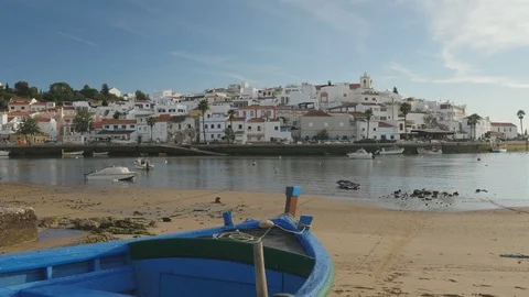 Slide forward over a boat in Ferragudo, Portugal Stock Footage 80118905