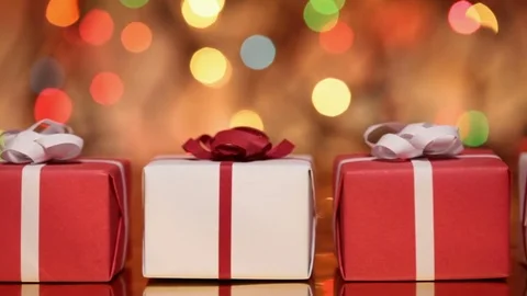 Slide in front of christmas presents Stock Footage 80908926