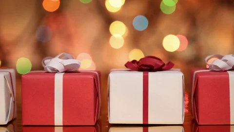 Slide in front of presents - gift boxes for christmas or other events Stock Footage 81118325