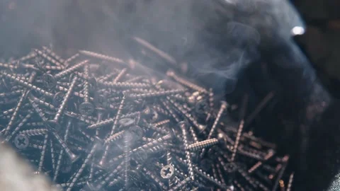 A slide of galvanized self-tapping screws at the factory Video stock 171112660