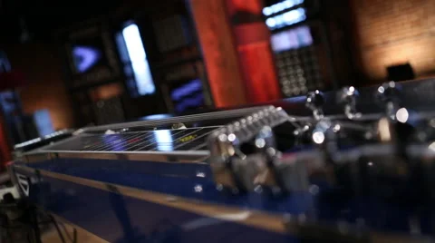 Slide guitar with strings and frets in focus Stock Footage 62997877