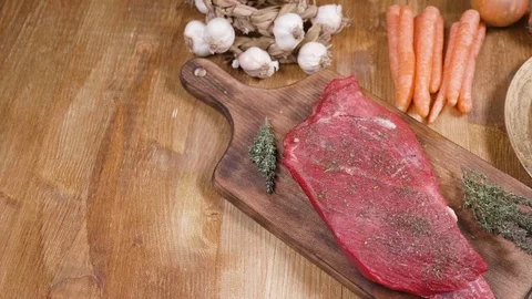 Slide from left to right over raw meat ready to be grilled Stock-Footage 103315693