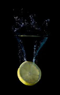 Slide of lemon splashing. Stock Photos