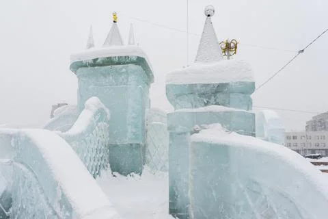 Slide made of ice .   objects made of snow and ice. .winter fun for children Stock Photos