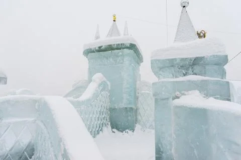 Slide made of ice .   objects made of snow and ice. .winter fun for children Stock Photos
