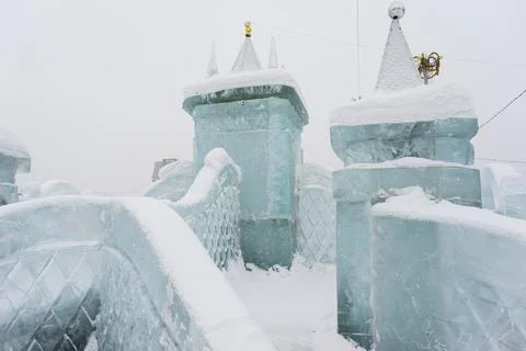 Slide made of ice .   objects made of snow and ice. .winter fun for children Stock Photos