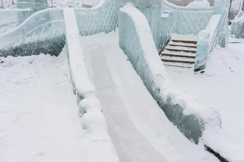 Slide made of ice .   objects made of snow and ice. .winter fun for children Foto stock