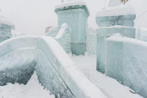 Slide made of ice .   objects made of snow and ice. .winter fun for children Stock Photos