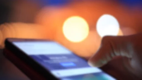 Slide mobile in public Stock Footage 94017755