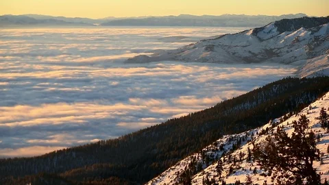 Slide Mountain Sunrise Cloud Inversion Time Lapse over Winter Landscape Stock Footage 99602414
