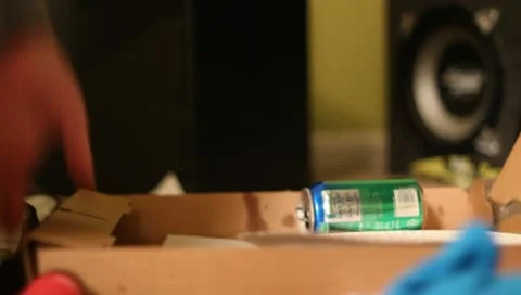 Slide out picking up empty pizza box Stock Footage 10905199