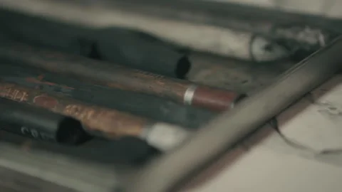 Slide Over Charcoal and Crayons on Artwork, Tools Resting After Creative Session Stock Footage 334736393