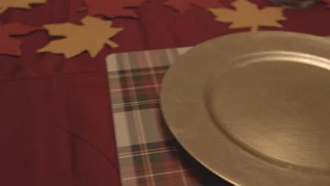 Slide over holiday place setting at dining room table Stock Footage 168842504