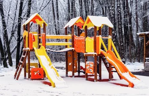 A slide in the park in winter Stock Photos