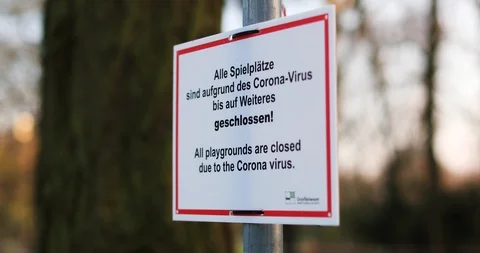 Slide in playground closed off Covid-19 Corona Virus Frankfurt germany Stock Footage
