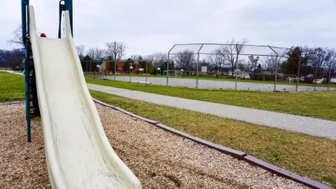Slide in Playground during Fall Stock Photos