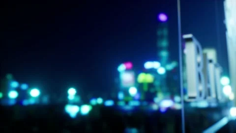 A Slide right rack focus to generic bank buidling at night Stock Footage 155300657