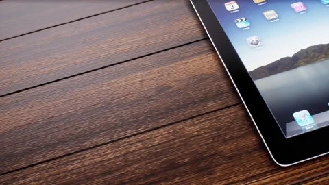 A Slide right of tablet angled on table Stock Footage 155222652