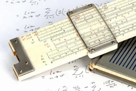 Slide rule close up with work sheet Stock Photos