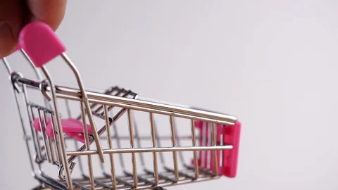 Slide shopping cart toy on white background Stock Footage 128785053