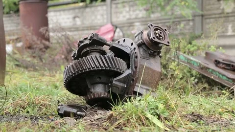Slide shot of broken engine part on a dump site Stock Footage 75218734