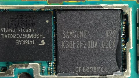 Slide shot of the electronic circuit board. Close-up of details of a smartpho Video stock 203823209